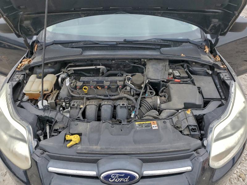 Photo 11 from auction – 2014 FORD FOCUS S with VIN 1FADP3E23EL203436