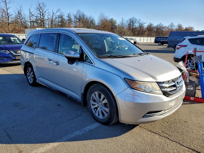 Photo 4 from auction – 2014 HONDA ODYSSEY EX with VIN 5FNRL5H68EB110694