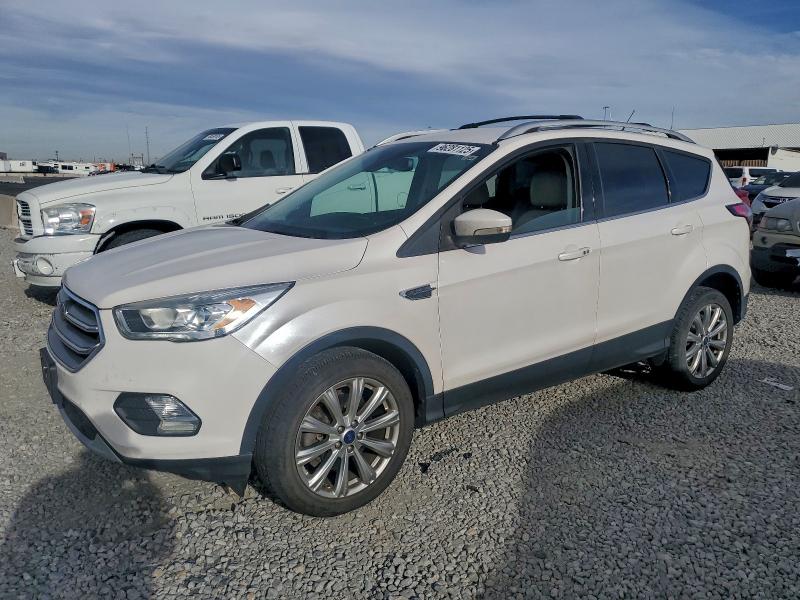 FORD ESCAPE TIT 2017 with VIN 1FMCU9JD0HUE61741 - Photo from auction