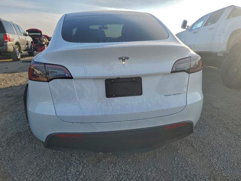 Photo 6 from auction – 2022 TESLA MODEL Y with VIN 7SAYGAEE2NF574135
