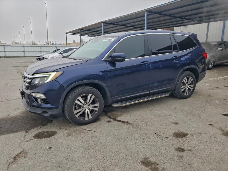 HONDA PILOT EXL 2016 with VIN 5FNYF5H63GB057876 - Photo from auction