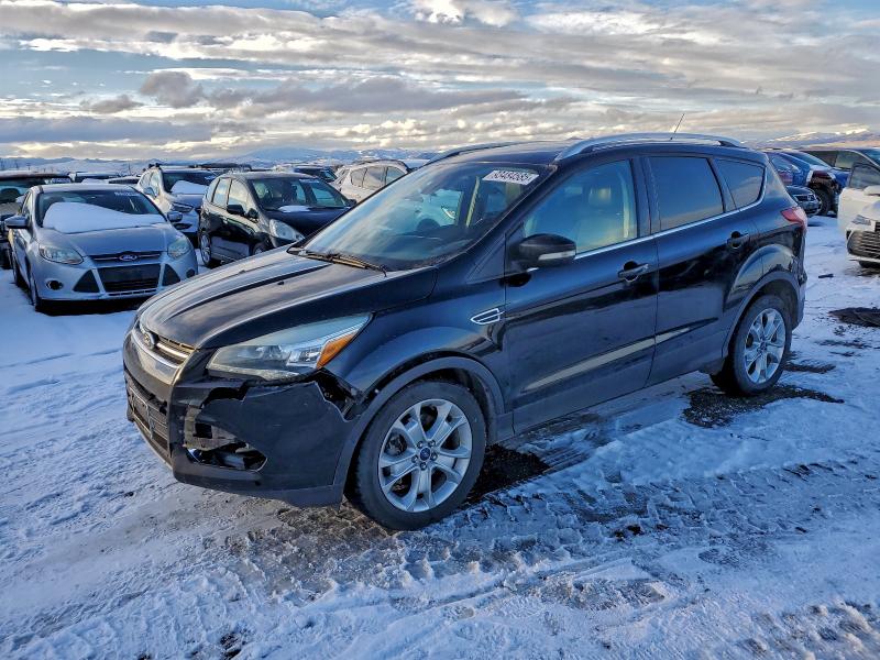 FORD ESCAPE TIT 2016 with VIN 1FMCU9J96GUA76484 - Photo from auction