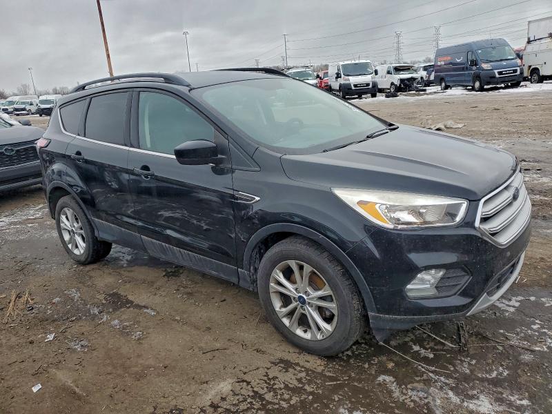 Photo 4 from auction – 2018 FORD ESCAPE SE with VIN 1FMCU0GDXJUB62024