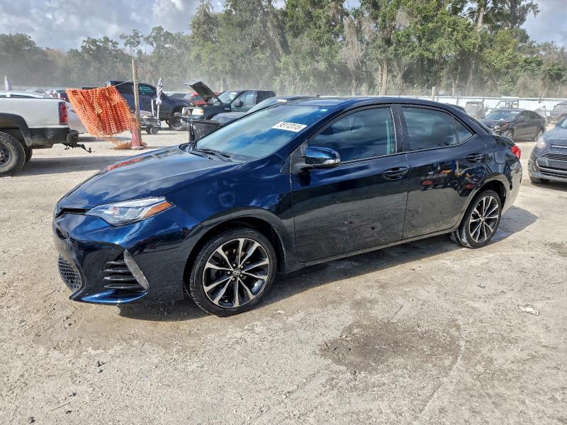 TOYOTA COROLLA L 2017 with VIN 2T1BURHE6HC848659 - Photo from auction