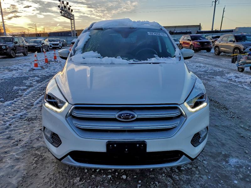 Photo 5 from auction – 2019 FORD ESCAPE TIT with VIN 1FMCU9J97KUA68693