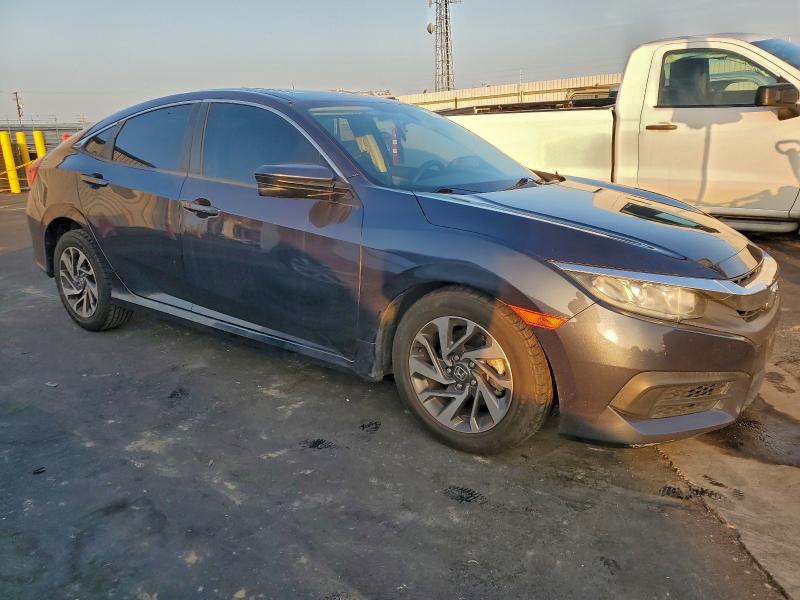 Photo 4 from auction – 2018 HONDA CIVIC EX with VIN 2HGFC2F71JH531143