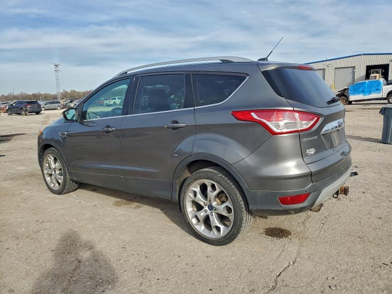 Photo 2 from auction – 2014 FORD ESCAPE TIT with VIN 1FMCU0J9XEUB59568