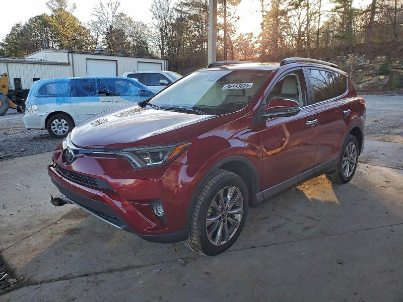 TOYOTA RAV4 LIMIT 2018 with VIN JTMYFREV9JD119606 - Photo from auction