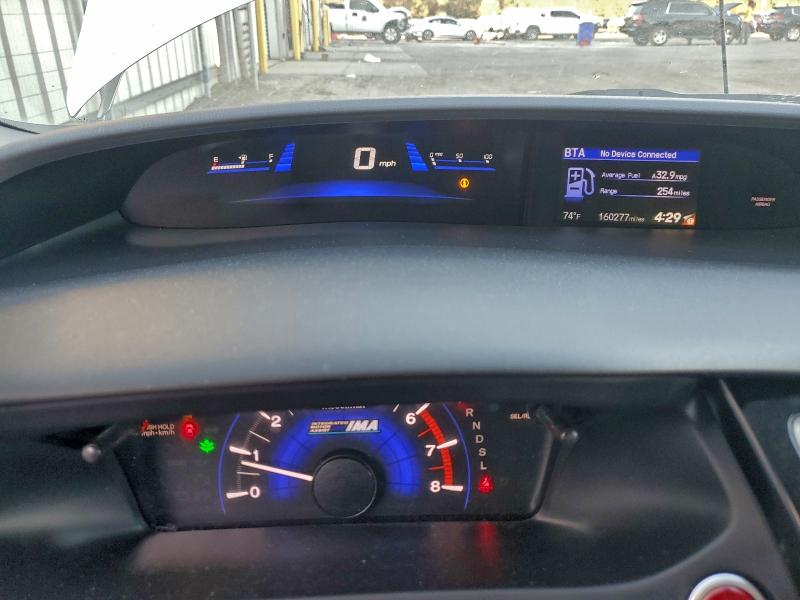 Photo 9 from auction – 2014 HONDA CIVIC HYBR with VIN 19XFB4F22EE000553
