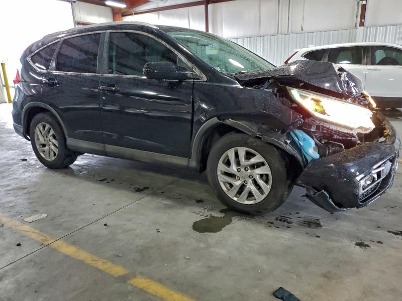 Photo 4 from auction – 2016 HONDA CR-V EXL with VIN 2HKRM3H71GH552683