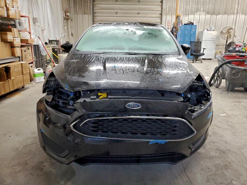 Photo 5 from auction – 2016 FORD FOCUS SE with VIN 1FADP3F21GL385123