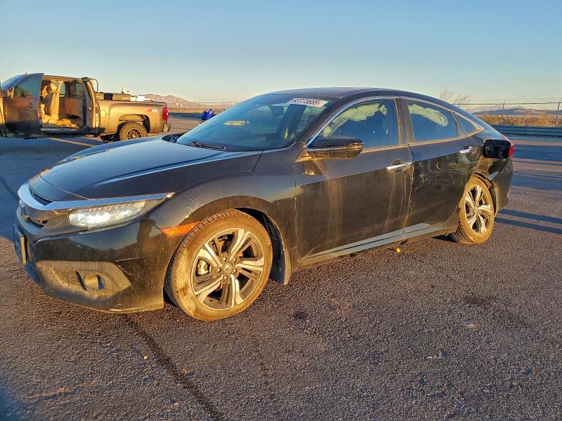 HONDA CIVIC 2016 with VIN 19XFC1F93GE027434 - Photo from auction