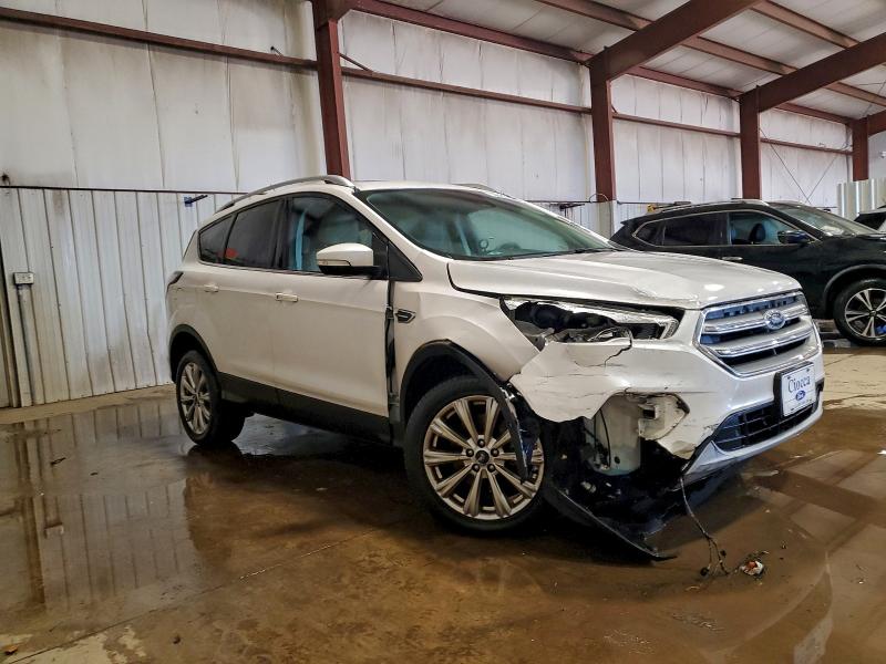Photo 4 from auction – 2017 FORD ESCAPE TIT with VIN 1FMCU9J98HUE83207