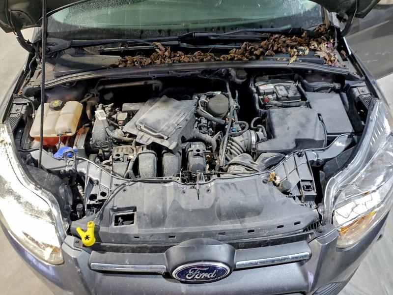 Photo 11 from auction – 2014 FORD FOCUS SE with VIN 1FADP3F27EL143868