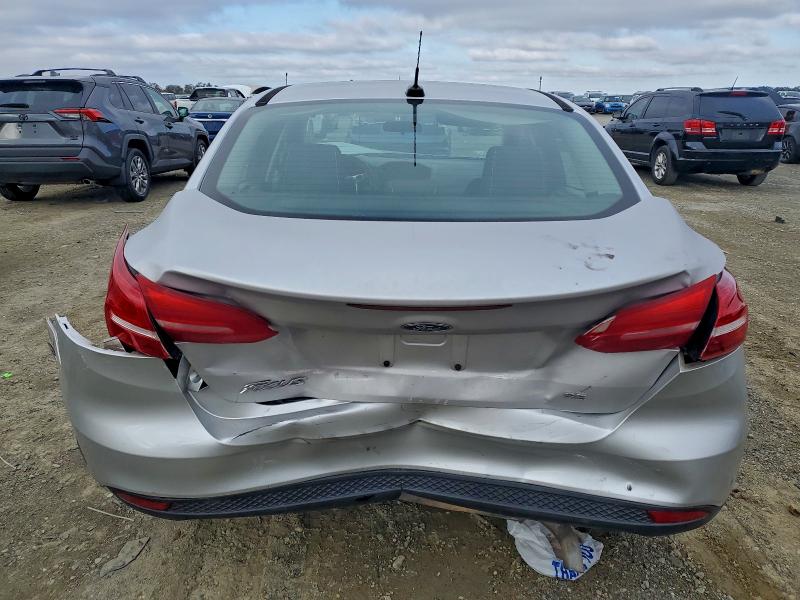 Photo 6 from auction – 2014 FORD FOCUS SE with VIN 1FADP3F2XEL112808