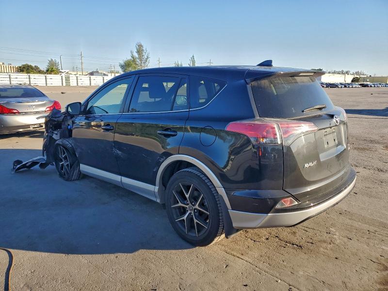 Photo 2 from auction – 2016 TOYOTA RAV4 SE with VIN JTMJFREV7GD183282