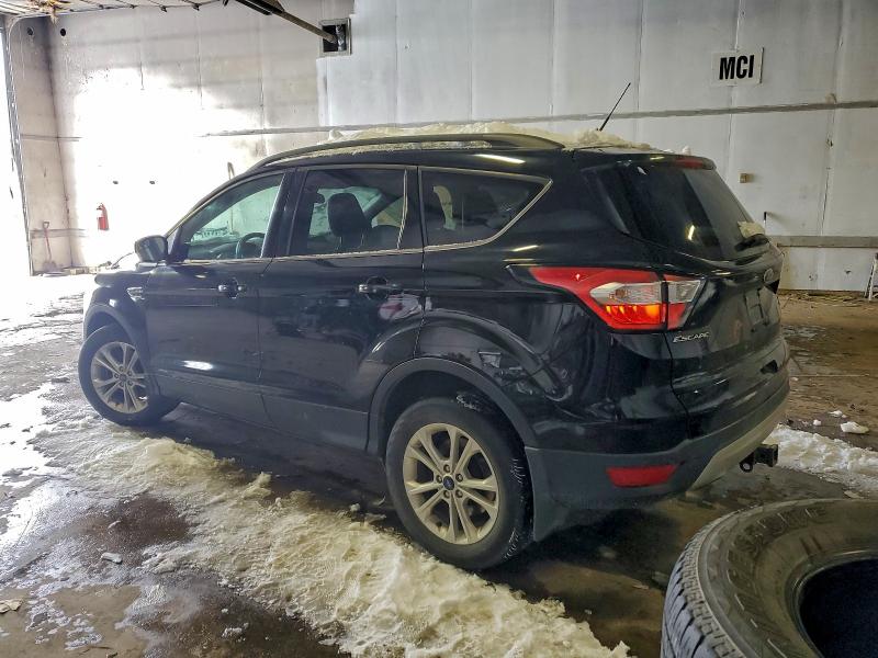 Photo 2 from auction – 2018 FORD ESCAPE with VIN 1FMCU9HD3JUC39089