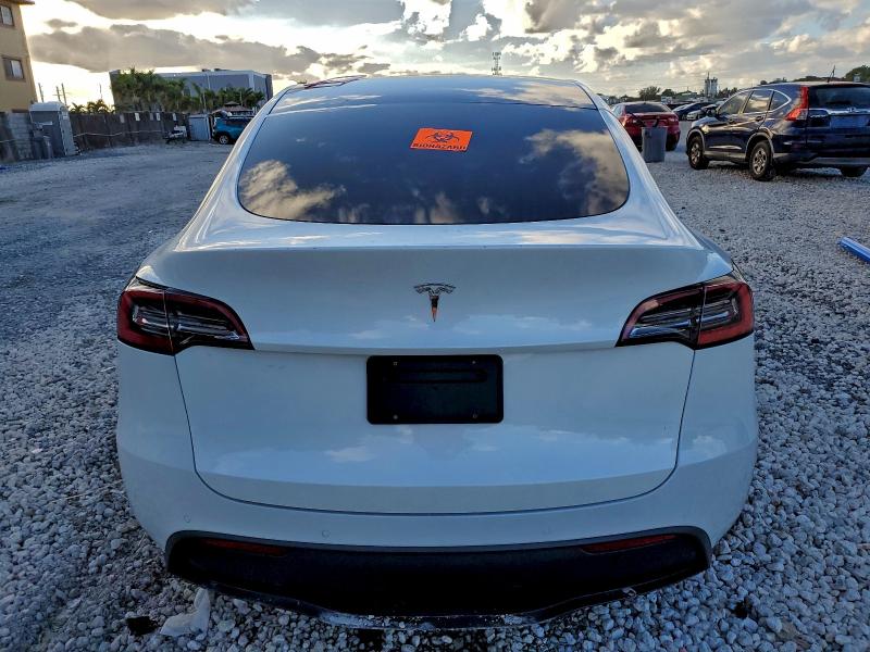 Photo 6 from auction – 2021 TESLA MODEL Y with VIN 5YJYGDED4MF109750