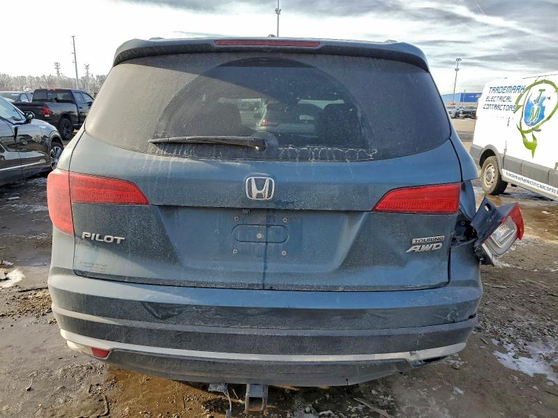 Photo 6 from auction – 2017 HONDA PILOT TOUR with VIN 5FNYF6H9XHB092108