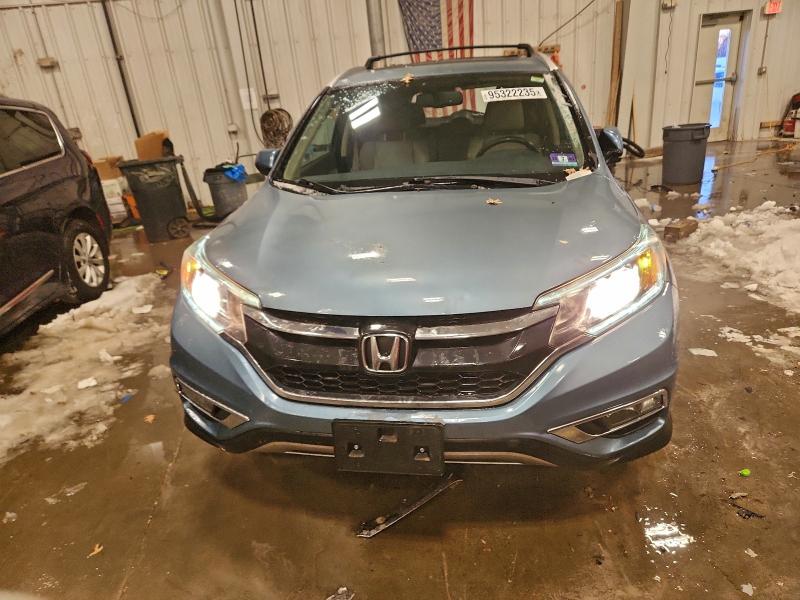 Photo 5 from auction – 2015 HONDA CR-V EXL with VIN 2HKRM4H77FH660679