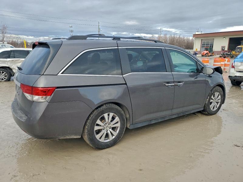 Photo 3 from auction – 2016 HONDA ODYSSEY with VIN 5FNRL5H65GB107075