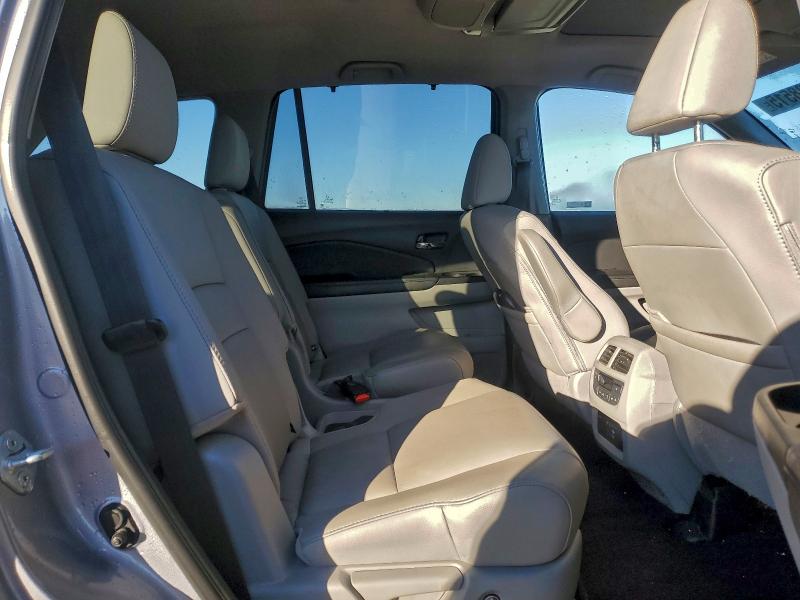 Photo 11 from auction – 2022 HONDA PILOT TOUR with VIN 5FNYF6H65NB062192