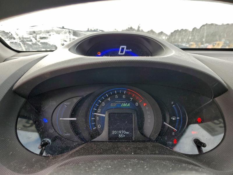 Photo 9 from auction – 2012 HONDA INSIGHT LX with VIN JHMZE2H5XCS004259