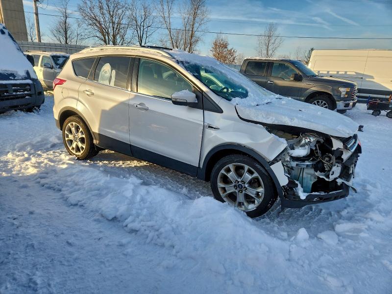 Photo 4 from auction – 2014 FORD ESCAPE TIT with VIN 1FMCU9J96EUD57374