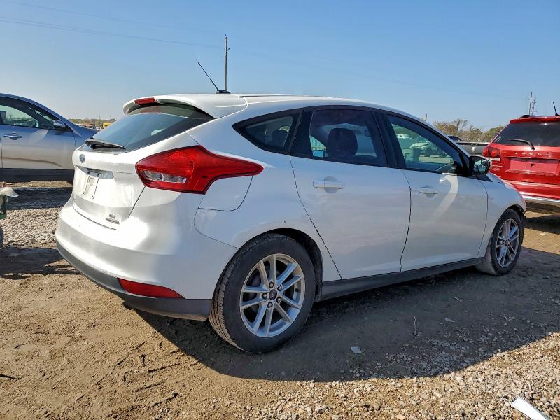 Foto 3 de la subasta – 2015 FORD FOCUS SE con VIN 1FADP3K24FL223491