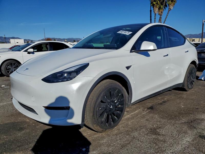 TESLA MODEL Y 2024 with VIN 7SAYGDED4RF040147 - Photo from auction