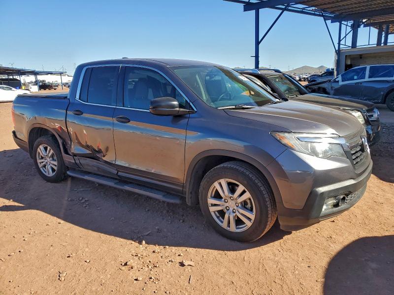 Photo 4 from auction – 2017 HONDA RIDGELINE with VIN 5FPYK2F28HB007459