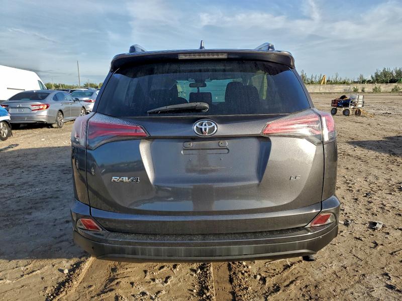 Photo 6 from auction – 2018 TOYOTA RAV4 LE with VIN JTMZFREV7JJ160984