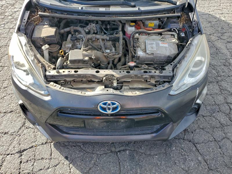 Photo 12 from auction – 2015 TOYOTA PRIUS C with VIN JTDKDTB36F1111905