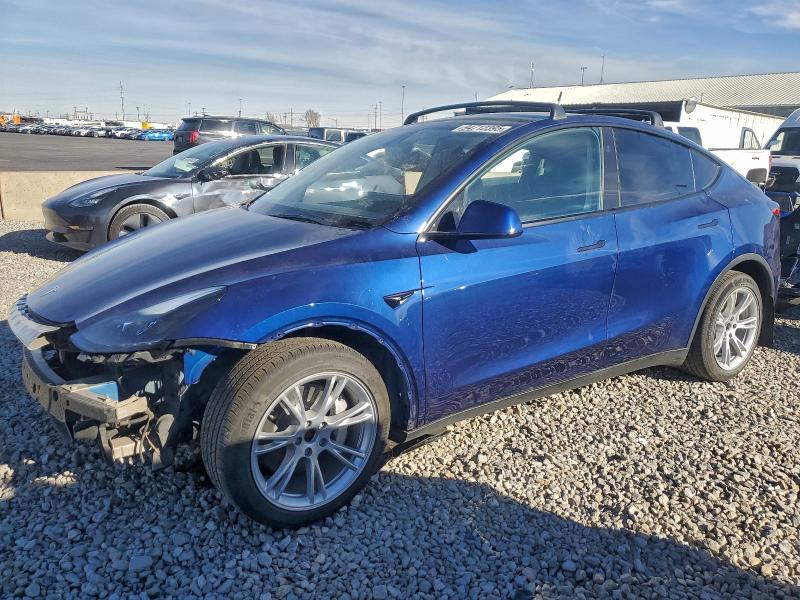 TESLA MODEL Y 2023 with VIN 7SAYGAEE4PF978153 - Photo from auction