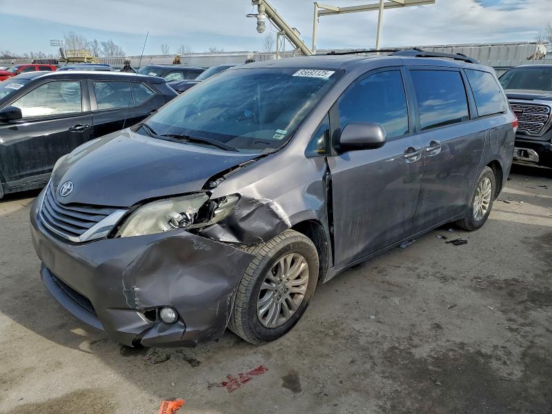 TOYOTA SIENNA XLE 2011 with VIN 5TDYK3DC9BS039110 - Photo from auction