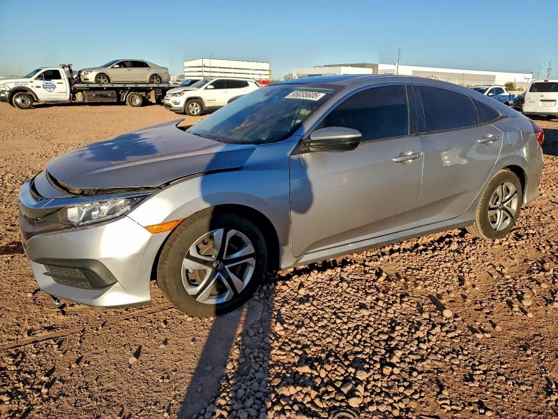 HONDA CIVIC LX 2018 with VIN 2HGFC2F58JH584792 - Photo from auction
