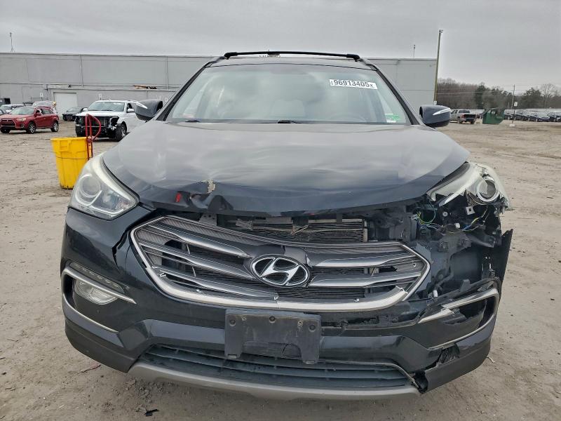 Photo 5 from auction – 2017 HYUNDAI SANTA FE S with VIN 5NMZU3LB9HH014730
