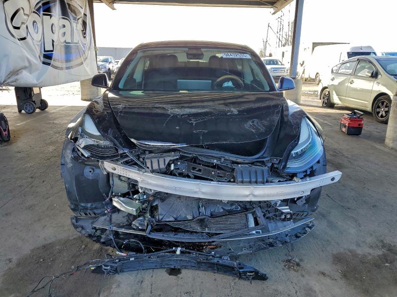 Photo 5 from auction – 2018 TESLA MODEL 3 with VIN 5YJ3E1EA2JF010733