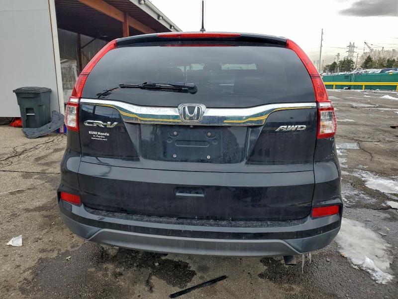 Photo 6 from auction – 2016 HONDA CR-V LX with VIN 2HKRM4H39GH706513