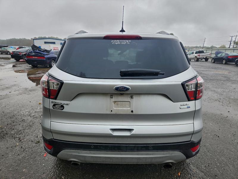Photo 6 from auction – 2018 FORD ESCAPE with VIN 1FMCU9HD0JUC07622