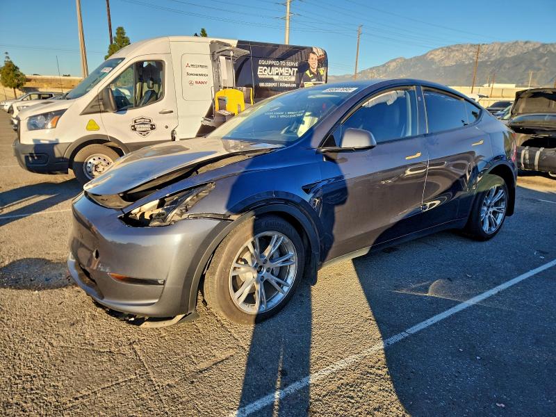 TESLA MODEL Y 2023 with VIN 7SAYGDEE4PF905477 - Photo from auction