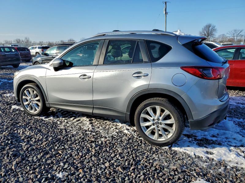 Photo 2 from auction – 2014 MAZDA CX-5 GT with VIN JM3KE4DYXE0384109