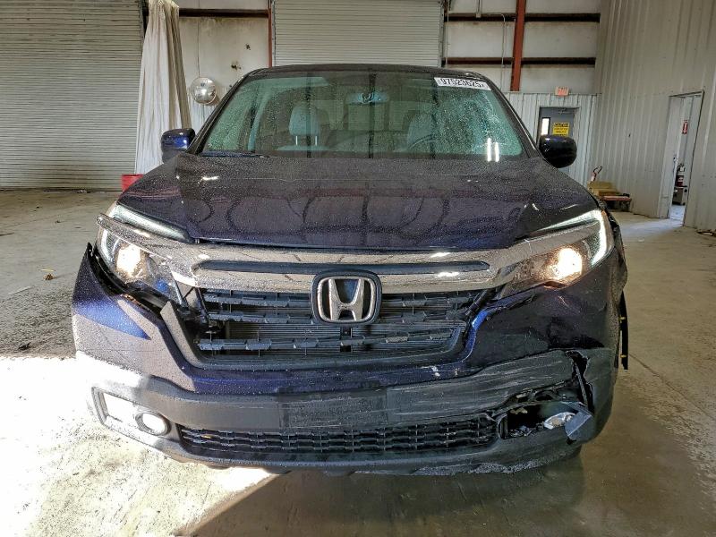 Photo 5 from auction – 2019 HONDA RIDGELINE with VIN 5FPYK3F66KB033431