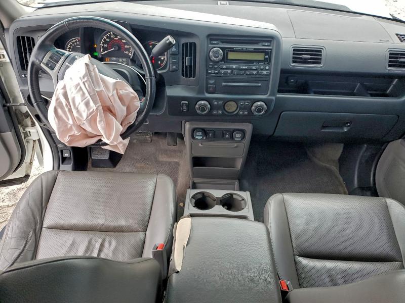 Photo 8 from auction – 2012 HONDA RIDGELINE with VIN 5FPYK1F53CB460546