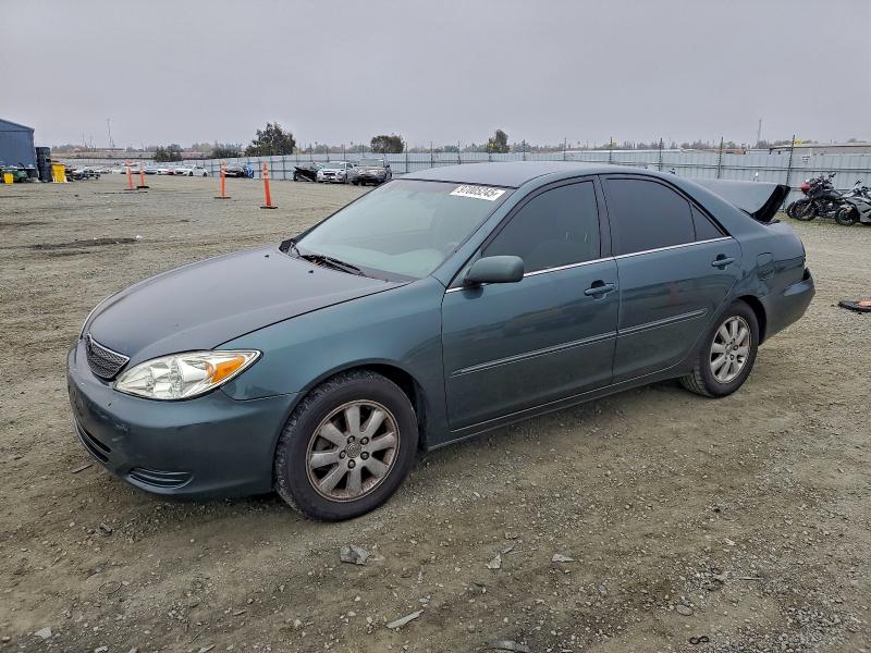 TOYOTA CAMRY 2002 with VIN 4T1BE30K12U578872 - Photo from auction