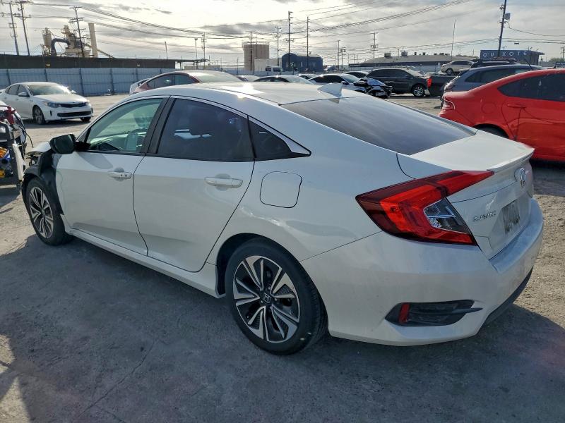 Photo 2 from auction – 2016 HONDA CIVIC EXL with VIN 2HGFC1F75GH632916