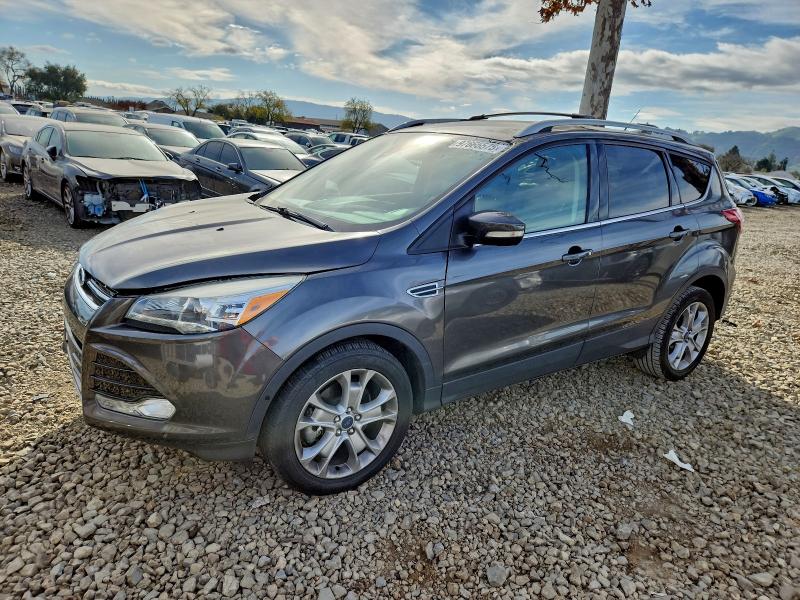 FORD ESCAPE TIT 2015 with VIN 1FMCU9J9XFUB33669 - Photo from auction