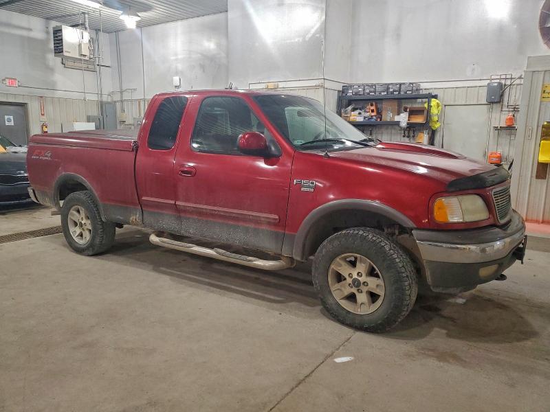 Photo 4 from auction – 2002 FORD F150 with VIN 1FTRX18L72NB17331
