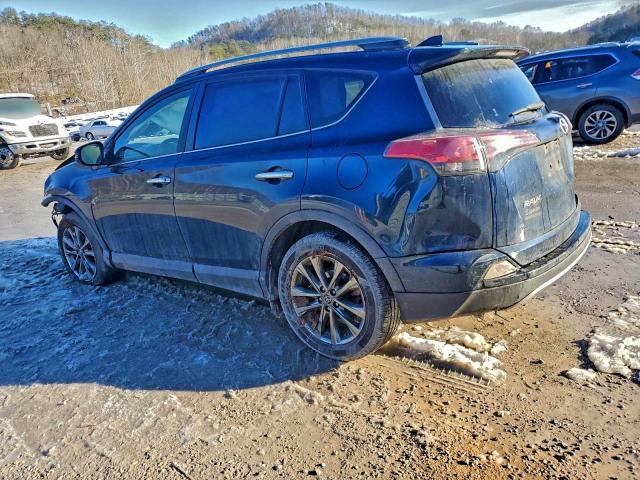 Photo 2 from auction – 2018 TOYOTA RAV4 LIMIT with VIN JTMDFREV4JJ239250