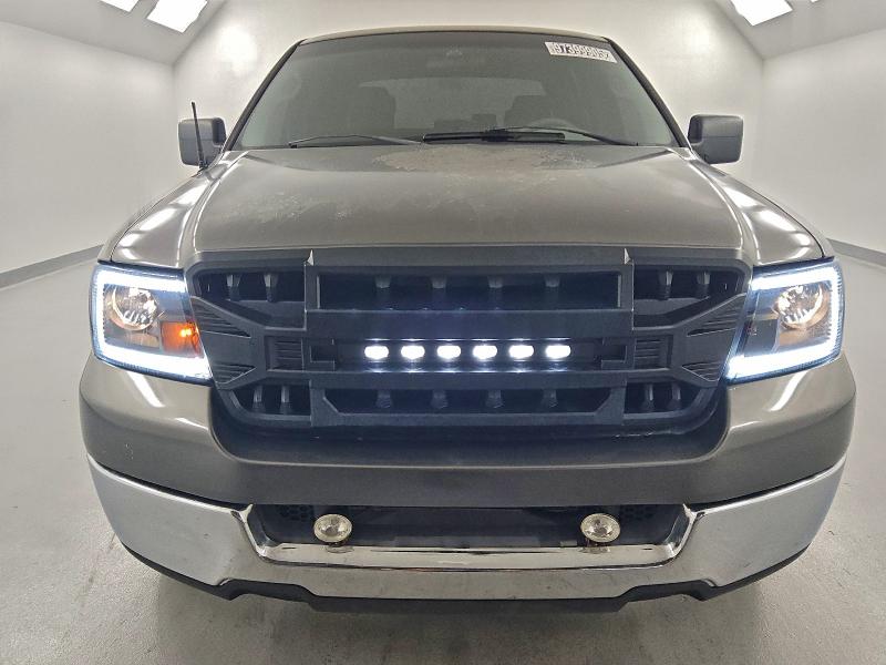 Photo 5 from auction – 2005 FORD F150 SUPER with VIN 1FTPW12565FB19462